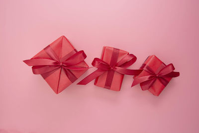 Close-up of red umbrella against white background