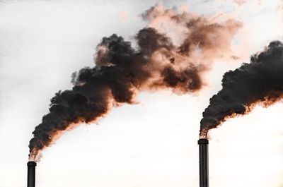 Close-up of metal against sky