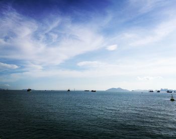 Scenic view of sea against blue sky