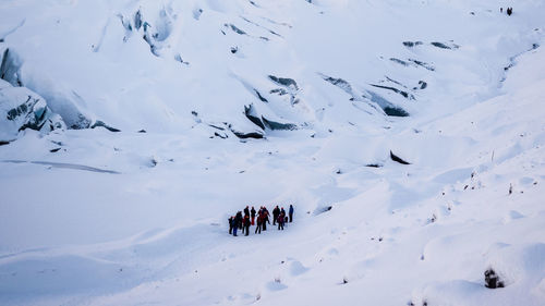 High angle view of people on snow