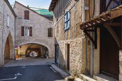 Monflanquin, france - october 17, 2021 architectural detail of typical houses in the city center 