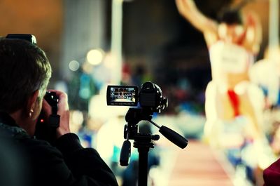 Close-up of woman photographing