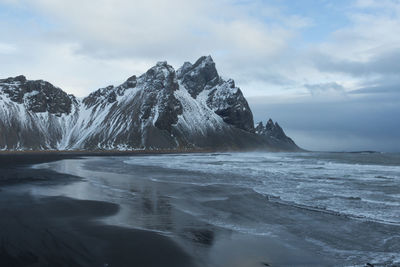 Scenic view of frozen sea against sky