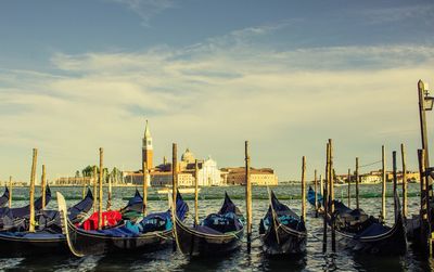 Boats moored at dock