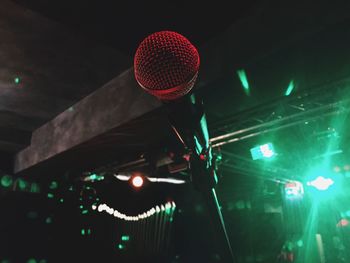 Man on illuminated stage