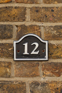 Close-up of number on wall