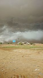 Storm clouds over field