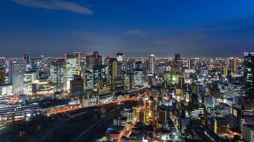 High angle view of illuminated cityscape at night