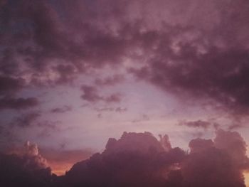 Low angle view of dramatic sky at sunset