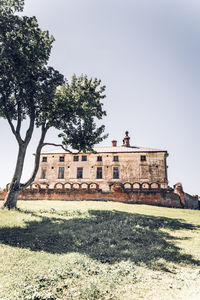 Built structure on field against clear sky