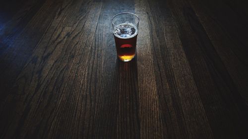 High angle view of beer glass on table