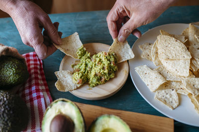 High angle view of man preparing food