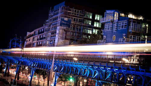 Light trails on city street at night
