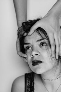 Close-up portrait of young woman