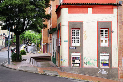 Street amidst houses and buildings in town