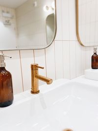 Close-up of faucet in bathroom