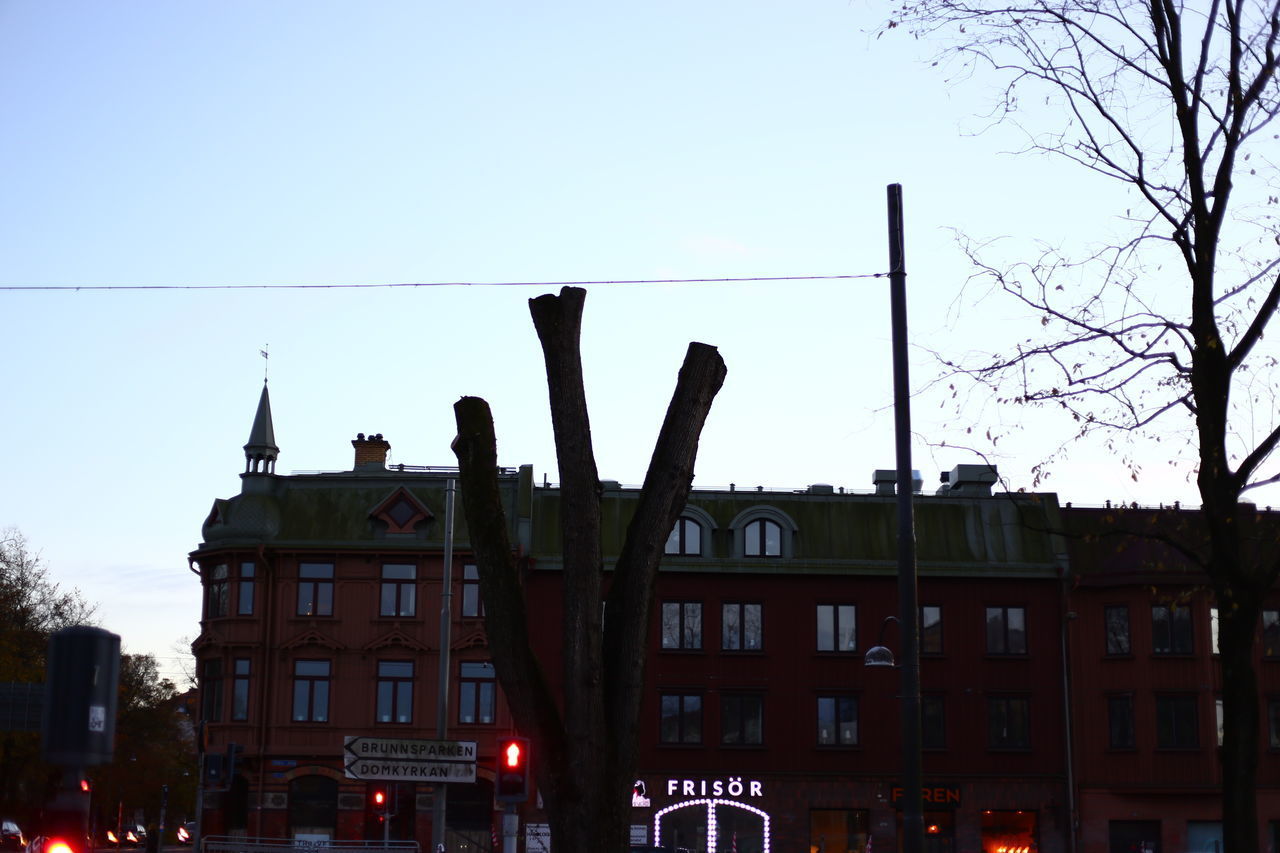 SILHOUETTE BUILDINGS AGAINST SKY