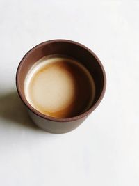 High angle view of coffee cup on table