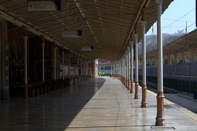 Columns in row at railroad station platform