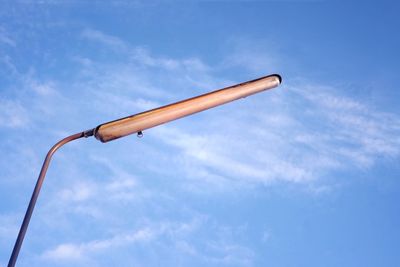 Low angle view of street light against sky