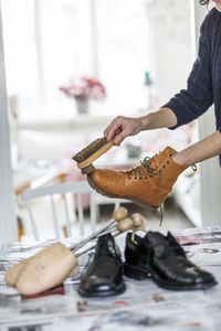 Person polishing shoes