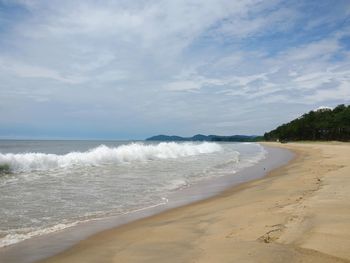 Scenic view of beach against sky