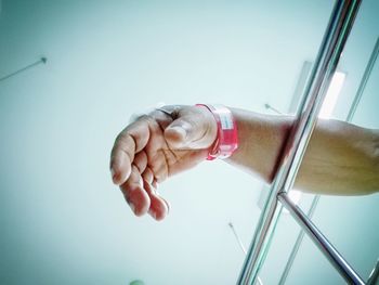 Close-up of woman hand against blurred background