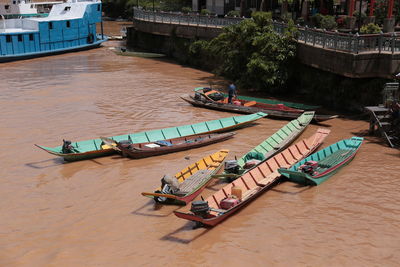 High angle view of boats moored in river