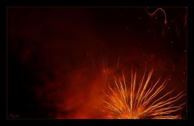 Low angle view of firework display