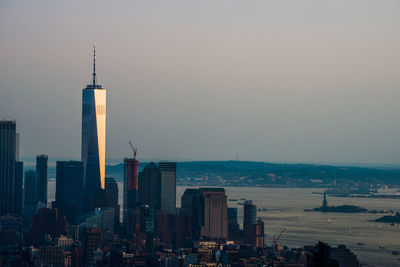 Modern buildings in city against sky
