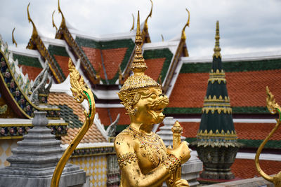 Statue of temple in building