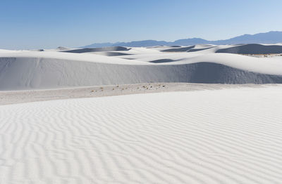 Gypsum sand dunes in white sands national park in late afternoon