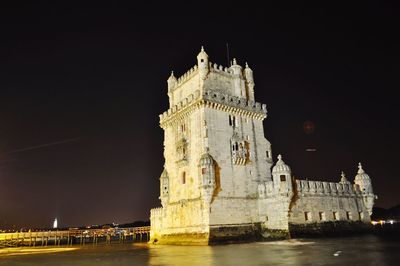 Low angle view of historical building against sky at night