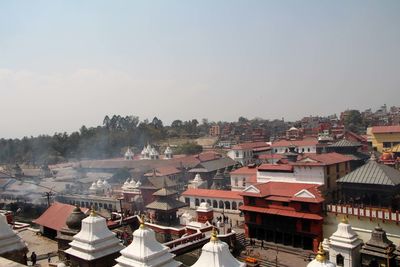 High angle view of residential district against sky