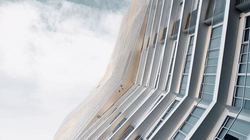 Low angle view of modern buildings against sky