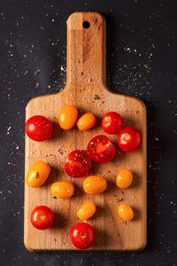 Directly above shot of fruits on cutting board