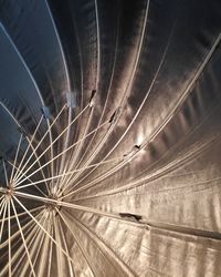 Low angle view of illuminated tunnel