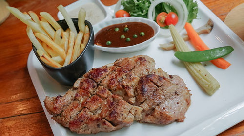 High angle view of food served on table