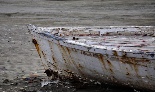 Abandoned boat on beach