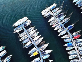 High angle view of boats moored in water