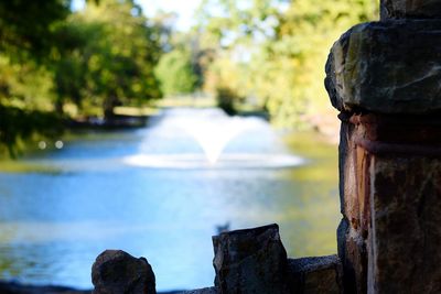 Close-up of water flowing over river in garden