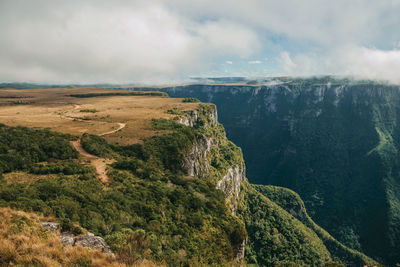 Fortaleza canyon with steep rocky cliffs covered by forest near cambará do sul. brazil.