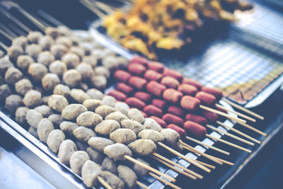 High angle view of meat on barbecue grill