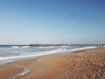 Scenic view of sea against clear sky