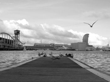 View of pier on bridge over sea against sky