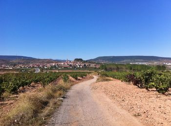 Empty road along landscape