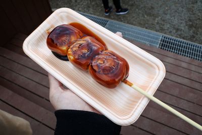 High angle view of person holding food