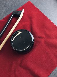 High angle view of red fabric on table