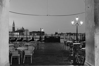 Chairs and tables against sky