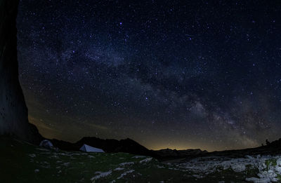 Low angle view of star field against sky at night